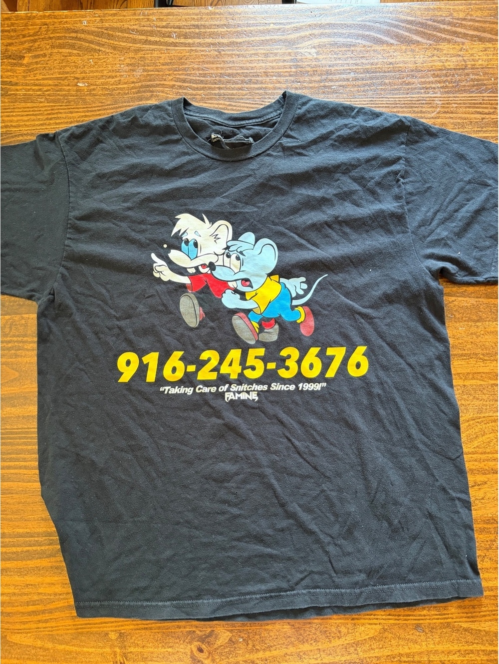 Vintage Famine Black Graphic T-Shirt with Cartoon Mice and Phone Number
